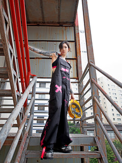 Dark Grey Overalls by TAPE OFF, featuring utility-inspired design, cuffed pant legs, neon pink stitching, and modern workwear-inspired style. Unisex streetwear overalls for industrial fashion and urban looks.