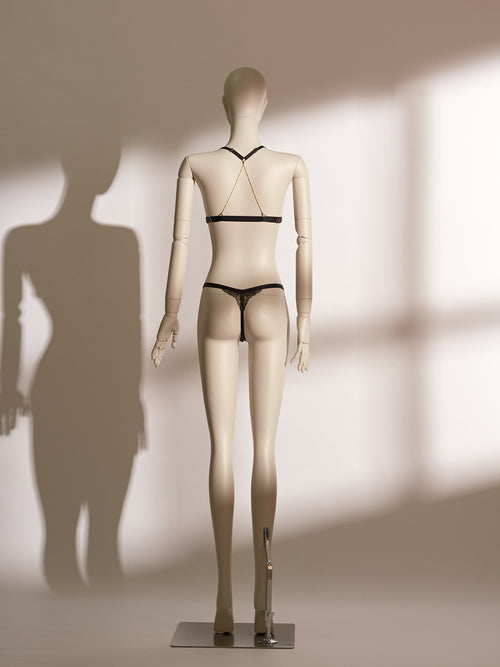 Celestial Chains Black Bralette Set featuring a sheer triangle lace bralette with gold accent hardware and matching lace thong, designed with gilded eyelash lace and a minimalist silhouette for a chic, sexy lingerie look.