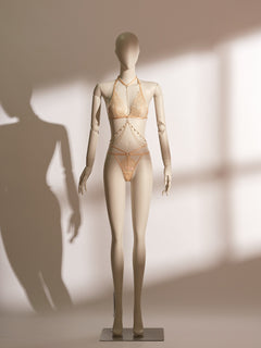 Celestial Divinity Gilding Bodychain Bralette Set featuring a sheer gold lace bralette with halter neck, matching lace thong, and detachable gold bodychain, offering a glamorous, seductive lingerie look with modern elegance.