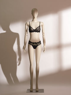Delores Wire Lace Bra Set featuring a black lace balconette bra with underwire support and matching Brazilian-cut lace panties, blending seductive elegance and comfort in a timeless lingerie design.