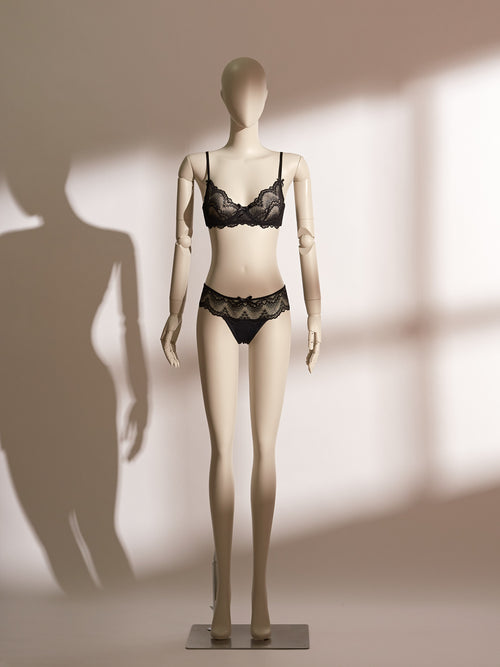 Delores Wire Lace Bra Set featuring a black lace balconette bra with underwire support and matching Brazilian-cut lace panties, blending seductive elegance and comfort in a timeless lingerie design.