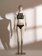 Delores Bralette Lace Set featuring a high-neck sheer black lace bralette with scalloped detailing and matching low-rise black briefs, offering a modern blend of elegance and comfort in seductive lingerie style.