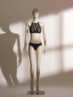 Delores Bralette Lace Set featuring a high-neck sheer black lace bralette with scalloped detailing and matching low-rise black briefs, offering a modern blend of elegance and comfort in seductive lingerie style.