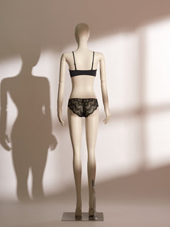 Delores Bralette Lace Set featuring a high-neck sheer black lace bralette with scalloped detailing and matching low-rise black briefs, offering a modern blend of elegance and comfort in seductive lingerie style.