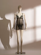 Emerald Obsidian Embroidery Babydoll featuring sheer black mesh, emerald green embroidered cups, delicate adjustable front bow, and matching thong, designed for an elegant and seductive lingerie look.