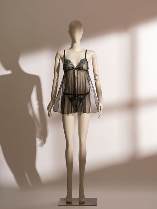 Emerald Obsidian Embroidery Babydoll featuring sheer black mesh, emerald green embroidered cups, delicate adjustable front bow, and matching thong, designed for an elegant and seductive lingerie look.