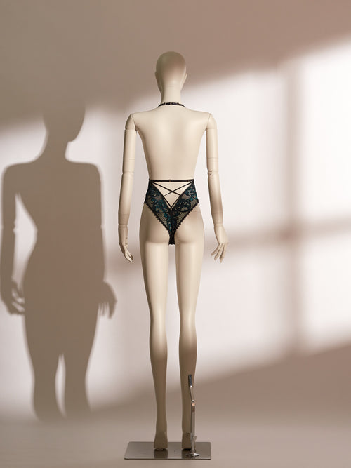 model wearing black sheer lace bodysuit