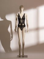 Black lace Isadora Padded Bodice Set featuring a structured corset-style top with 3mm padded underwire cups, intricate floral lace paneling, non-removable garter straps, and a coordinating soft mesh lace tanga.