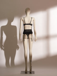 Black lace Isadora Padded Bodice Set featuring a structured corset-style top with 3mm padded underwire cups, intricate floral lace paneling, non-removable garter straps, and a coordinating soft mesh lace tanga.