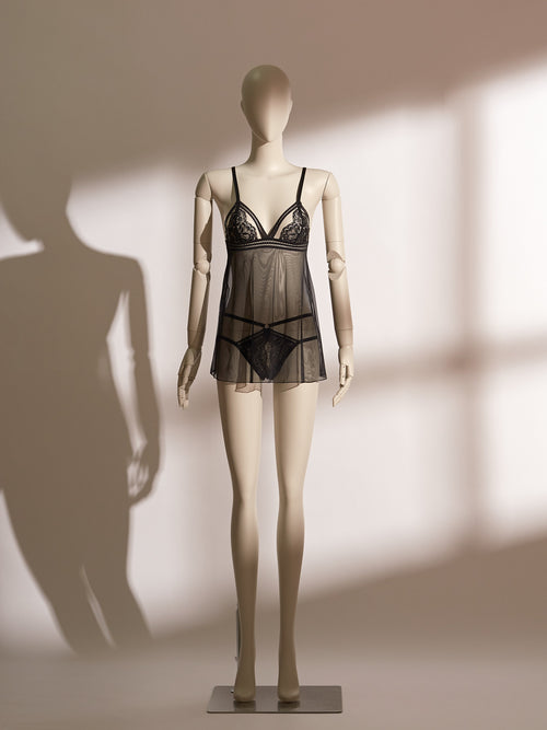 Midnight Allure Shimmer Babydoll featuring sheer black mesh, floral lace triangle cups, a plunging V-neckline, and matching strappy lace thong for an elegant, romantic silhouette.