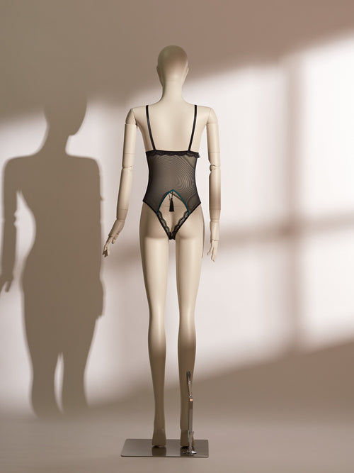 Nocturne Tassel Ouvert Bodysuit with sheer mesh, emerald satin detailing, and provocative tassel accents for seductive elegance