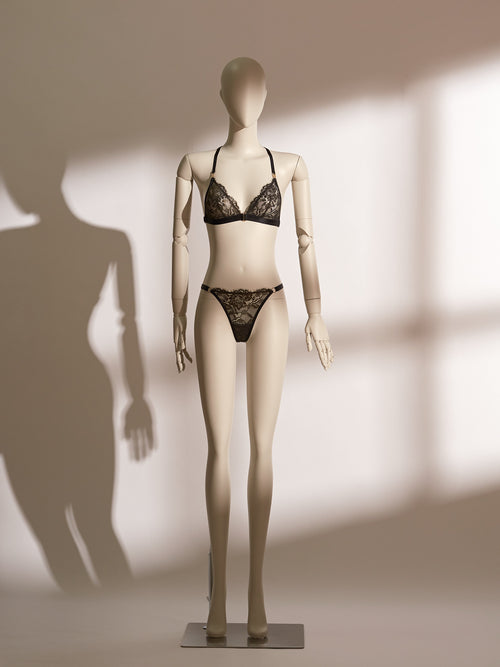 Celestial Chains Black Bralette Set featuring a sheer triangle lace bralette with gold accent hardware and matching lace thong, designed with gilded eyelash lace and a minimalist silhouette for a chic, seductive lingerie look.