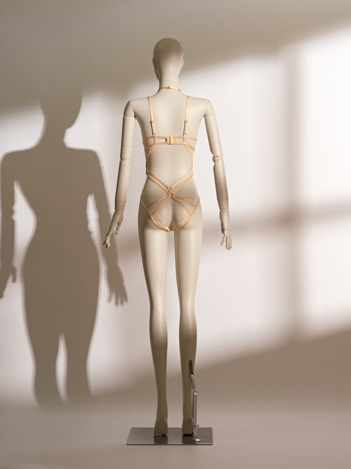 Celestial Chains Golden Ouvert Bodysuit featuring luxurious golden lace, open-cup detailing, and provocative ouvert design for sophisticated seduction