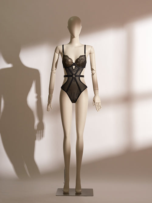 Valentina Noir Teddy featuring black mesh and gold lace cups, open crotch design, and adjustable waist strap—an avant-garde, seductive bodysuit by Pills N Poison.